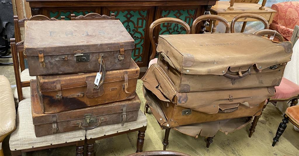 Five various brown leather suitcases, largest 80cm wide